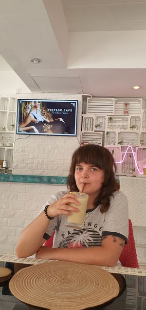 Me enjoying a banana and peanut drink at Soul Phuket in Phuket