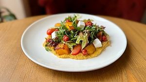 pumpkin salad with vegan feta   at Ola Healthy Cafe in Khmelnytskyi