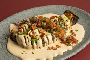"Sabiche a la Plancha"
Smoked eggplant with a filling of vegetarian minced meat garnished with tahini sauce, nuts, and pico de gallo salad. at Hummus YA! in Mexico City