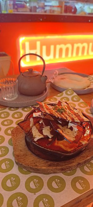 Shakshuka con berenjena y té negro. at Hummus YA! in Mexico City