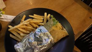 Falafel wrap and fries (warning the fryer is not exclusively vegan)  at Jungle SV in El Tunco