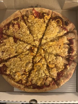 Pepperoni, sausage and banana peppers with stuffed crust.   at Vegan Pizza House in Vancouver