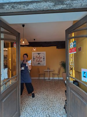 the entrance + a friendly member of the staff, one of the cooks too i think at Fala Fala in Funchal