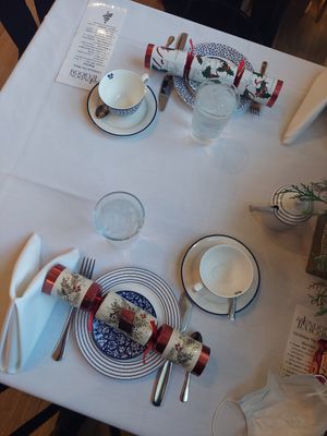 Table setting with Christmas crackers at The London Tea Room in St Louis