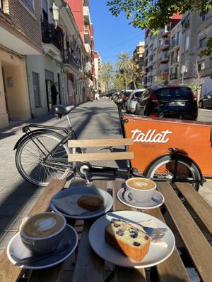 Oat milk flat whites + coconut cookie + blueberry cake at Tallat in Valencia
