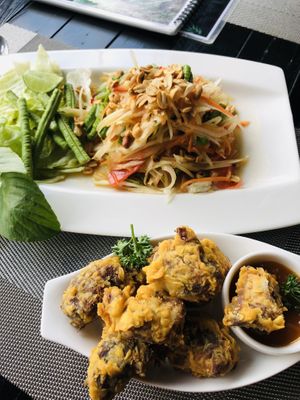 Papaya salad (som tum) and vegan nuggets  at Plant-erian in Krabi