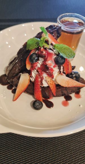 Chocolate waffles with coconut cream and fruits at Plant-erian in Krabi
