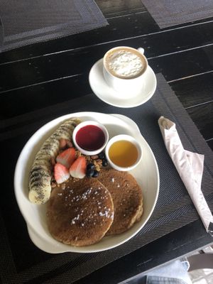 Pancakes and cappuccino  at Plant-erian in Krabi
