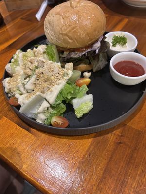 Tonkatsu burger with salad  at Plant-erian in Krabi