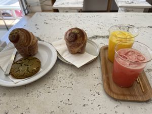 Pistachio cruffins (very good), white choco matcha cookie (quite good) and freshly squeezed orange and grapefruit juice.  at Saint-Jean in Amsterdam