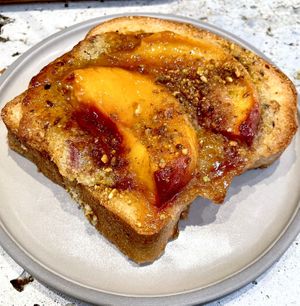 Seasonal Bostock of Peach, Pistachio, Roasted Nut Cream, Brioche  at Saint-Jean in Amsterdam