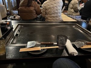 Seating on floor on tatami mats. Griddle to keep food warm while you eatt  at Gion Tanto - 祇園たんと in Kyoto