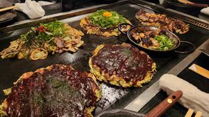 Mine was soy okonomiyaki and my sister had the plain one beside me at Gion Tanto - 祇園たんと in Kyoto
