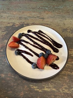 Vegan Panna Cotta with berry drizzle. Yum!   at Terra Kitchen in Redmond