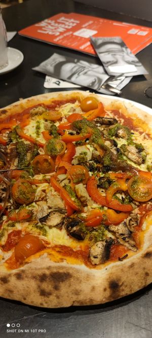 Vegetarian pizza but vegan cheese at Happy Italy in Enschede