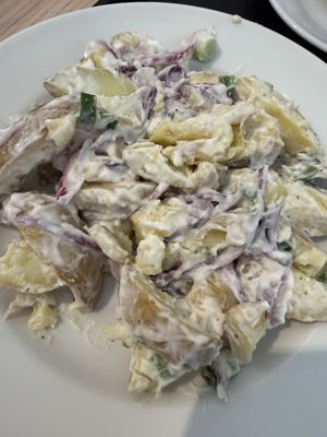 Vegan potato salad (labelled as being made with vegan mayo)  at Red Coat Cafe in Edinburgh