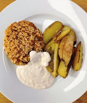 Carrot cake loaded with millet, potato wedges, garlic-bean sauce at WeVegan in Ballincollig