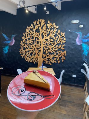 Lúcuma-Cake in front of the mural at their restaurant near the main square  at Vital Foods in Trujillo