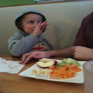 DS eating the Fruit Plate at Pure Healthy Eatery in The Woodlands