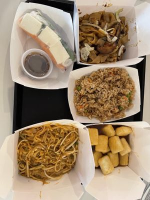 Fresh tofu roll, shiitake wide noodles, side vegan fried rice, orange tofu, vegan pad Thai    at Stiks in Sarasota