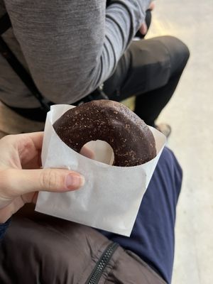 chocolate doughnut i believe , it’s mix between bread and cake but also a doughnut a little dense but perfect chocolate to doughnut ratio for me  at Tokyo Vegan Bakes in Tokyo