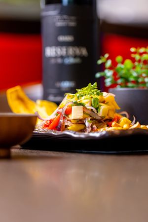 Ceviche Vegan: Heart of palm, mango, avocado, cucumber, red onions, red bell pepper, cilantro, leche de tigre & chips plantain. at Shibuya Sushi Art - Weston in Weston