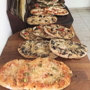 Focaccia Bread (vegetarian + vegan varieties)  at Bayit 77 in Amirim