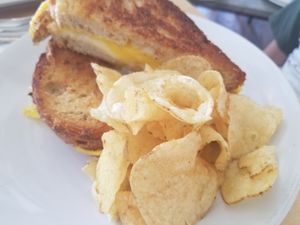 classic grilled cheese with potato chips at The Mercury Café in New Castle