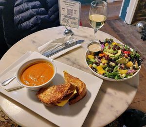 Vegan creamy tomato soup, grilled cheese, Harmony bowl at The Mercury Café in New Castle