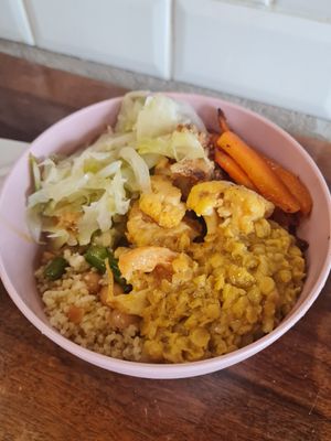 Cous cous bowl with veggies and lentil dahl at Terracotta in Verona