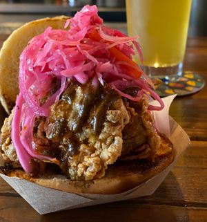 Vegan “chikn” sandwich with mama’s pickled slaw at Isabel's Vegan Cuisine in Miami