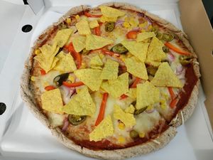 Pizza with mock cheese and nachos - vegan. at RAJ in Bialystok