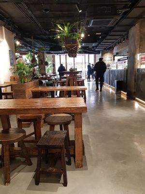 A rare pic of the restaurant not being crowded bc it's 11 at Honest Greens - Tuset in Barcelona