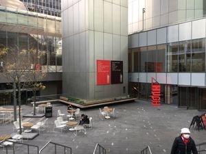 Outdoor seating, entrance to building (near the subway entrance) at Avocaderia - The Hugh in New York City