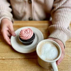Cupcake and latte at Wild Chestnut Cafe in Florence