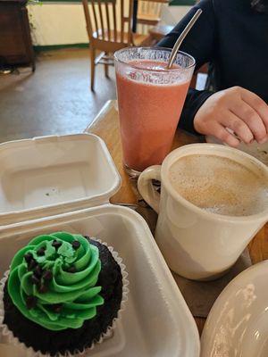Cappuccino, smoothie, and a takeaway cupcake at Wild Chestnut Cafe in Florence
