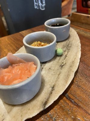 Pickled ginger, fried crispy garlic and soy sauce   at Quyu's Taproom in Jaipur