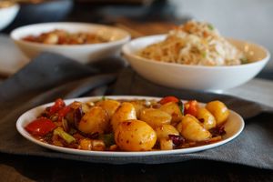 Kung Pao Potatoes. Vegan.
baby potatoes. bell peppers. water chestnut.
peanuts. dry red chili. at Inchin's Bamboo Garden in Nashville