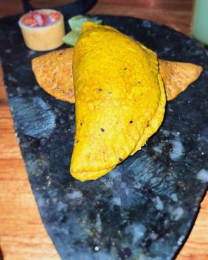 Empanada with 3 different kinds of tomatoes and empanada with “Vegallina"   at Salvajes in Cusco