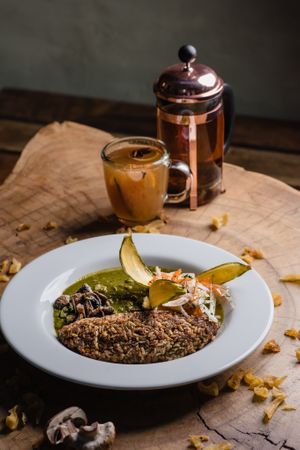 Tacu-tacu con seco de champiñones at Salvajes in Cusco