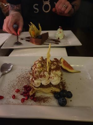 Pistachio tiramisu and an after eight torte in the background at Cafe Roya in Beeston
