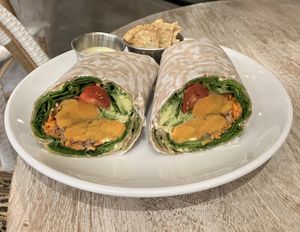 Crunchy veggie wrap (comes with pita chips and green goddess dressing )  at Pura Vida in West Palm Beach