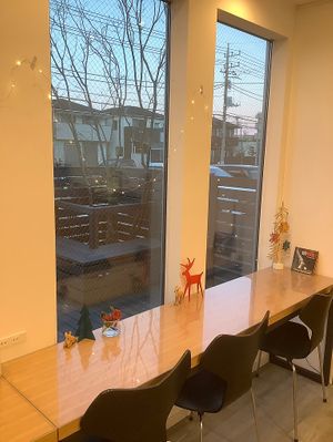 The indoor seating area at Vegan-Deli Optimist! in Sakura