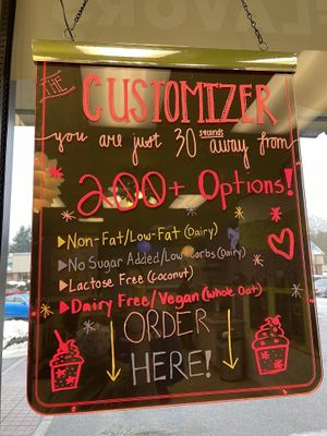 sign explaining what is offered on the tablet to order   at Skinny D's Yogurt in Mill Creek
