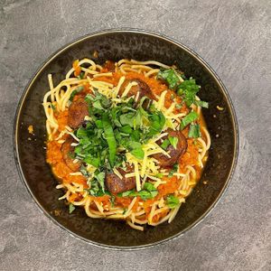 Vegan tomato spaghetti with no-meat balls at Mamafood in Prague