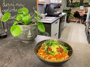 Vegan tomato spaghetti with vegan cheese and nomeat balls at Mamafood in Prague