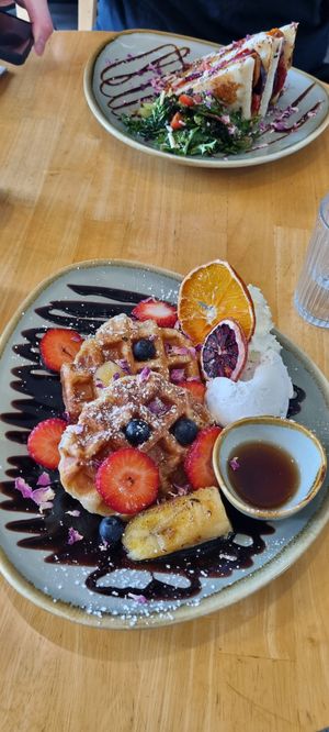 Croffle with choc sauce and berries at Pancha Cafe in Hamilton