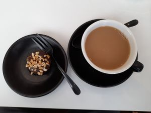 Choc peanut protein ball, pot of English Breakfast tea, soy milk at Dicki's in Ascot