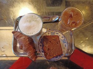 Croissant, banana bread, matcha and iced latte at Leopold in Brussels