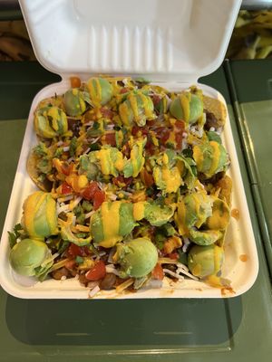 Vegan Nachos! These are delicious   at LaRayia's Bodega in Atlanta